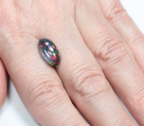 Потрясающей красоты опал в цветах "Арлекин" 3,13 карата 