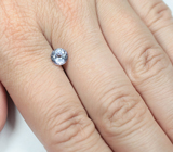 Фиолетовато-синий цоизит высокой чистоты 1,18 карата 