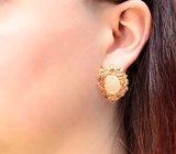 Массивные золотые серьги с крупными ограненными эфиопскими опалами 7,94 карата, танзанитами, сапфирами и бриллиантами