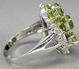 Замечательное кольцо с перидотами Серебро 925