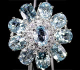 Замечательное кольцо-цветок с голубыми топазами Серебро 925