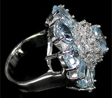 Замечательное кольцо-цветок с голубыми топазами Серебро 925