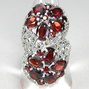 Оригинальное кольцо с гранатами