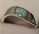 Изящное кольцо с черным опалом высочайшего качества