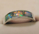 Изящное кольцо с 3 черными опалами высочайшего качества