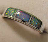 Кольцо с черными опалами