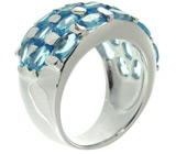 Широкое кольцо с ярко-голубыми топазами Серебро 925