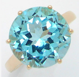 Золото Кольцо с ярким голубым топазом