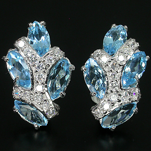 Великолепные серьги с голубыми топазами