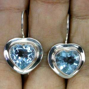 Изящные серьги с голубыми топазами