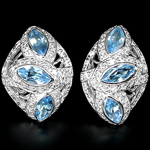 Эффектные серьги с голубыми топазами