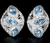 Эффектные серьги с голубыми топазами Серебро 925