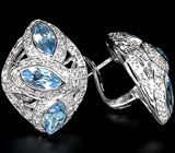 Эффектные серьги с голубыми топазами Серебро 925