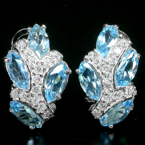 Великолепные серьги с голубыми топазами