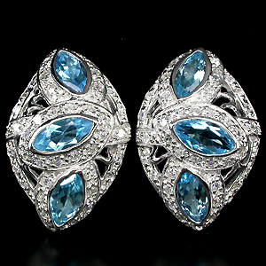 Эффектные серьги с голубыми топазами