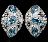 Эффектные серьги с голубыми топазами Серебро 925