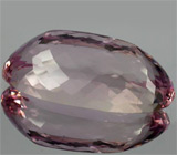 Крупный пурпурно-розовый кунцит 55,9 карат 