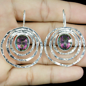 Оригинальные серьги с мистическими топазами