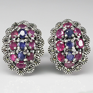 Серьги с пурпурными и синими сапфирами