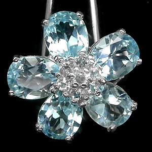 Прелестное кольцо-цветок с топазами