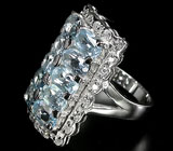 Стильное кольцо с голубыми топазами Серебро 925