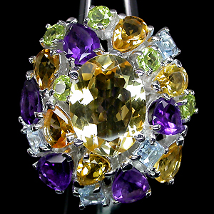 Массивное кольцо с самоцветами