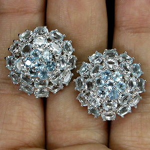 Замечательные серьги с голубыми топазами