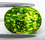 Великолепный зеленый сфен 4,69 карат 