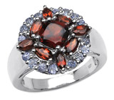 Яркий родолит гранат в кольце танзанитов Серебро 925