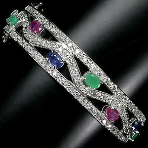 Элегантный браслет с сапфирами и изумрудами