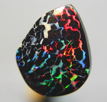 Австралийский болдер опал 1,22 карат