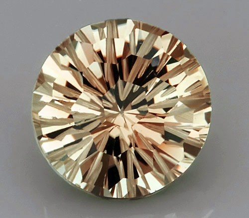 Желтый топаз авторской огранки "Universe" 9,4 карат