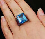 Кольцо c голубым топазом и пурпурно-розовыми сапфирами Серебро 925