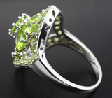 Замечательное серебряное кольцо с перидотами Серебро 925