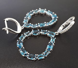 Стильные серебряные серьги с насыщенно-синими и бесцветными топазами Серебро 925