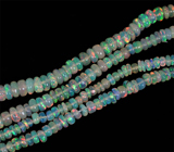 298 эфиопских опалов 24,37 карат на нити 