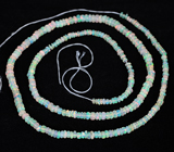 298 эфиопских опалов 24,37 карат на нити 