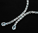 Изысканный серебряный комплект с голубыми топазами Серебро 925