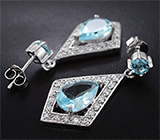 Стильные серебряные серьги с голубыми топазами Серебро 925