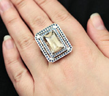 Золотое кольцо с рутиловым кварцем авторской огранки и синими сапфирами Золото