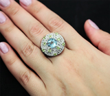 Стильное серебряное кольцо с голубым топазом и перидотами Серебро 925