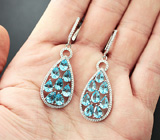 Очаровательные серебряные серьги с голубыми топазами Серебро 925