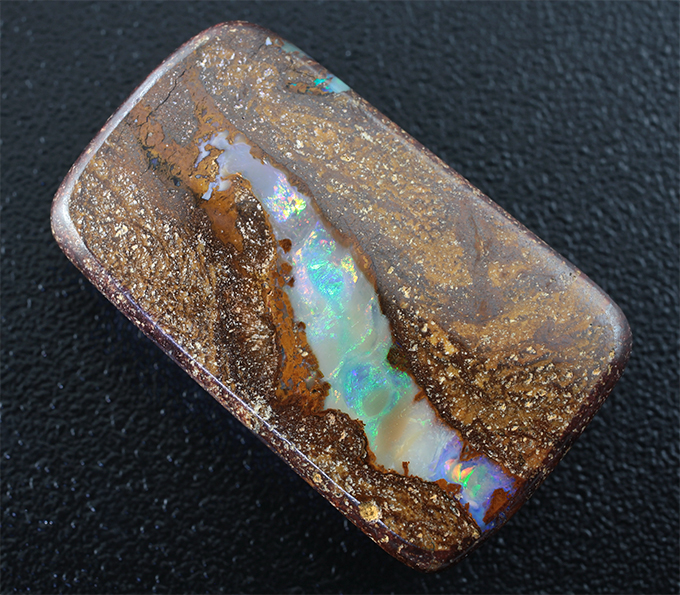 Австралийский болдер опал 64,71 карат
