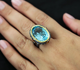 Серебряное кольцо с голубым топазом, рубинами и синими сапфирами Серебро 925