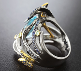 Серебряное кольцо с голубым топазом, цаворитами и синими сапфирами Серебро 925