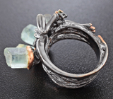 Серебряное кольцо с кристаллами аквамаринов и перидотом Серебро 925