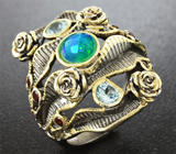 Серебряное кольцо c ограненным эфиопским опалом, голубыми топазами и мозамбикскими гранатами Серебро 925
