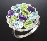 Серебряное кольцо с голубыми топазами, аметистами и перидотами Серебро 925