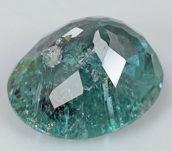 Кабошон турмалин параиба. Турмалин параиба кристалл. Индиголит синий. Голубой турмалин камень. Турмалин индиголит ограненный.