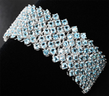 Широкий серебряный браслет с голубыми топазами Серебро 925
